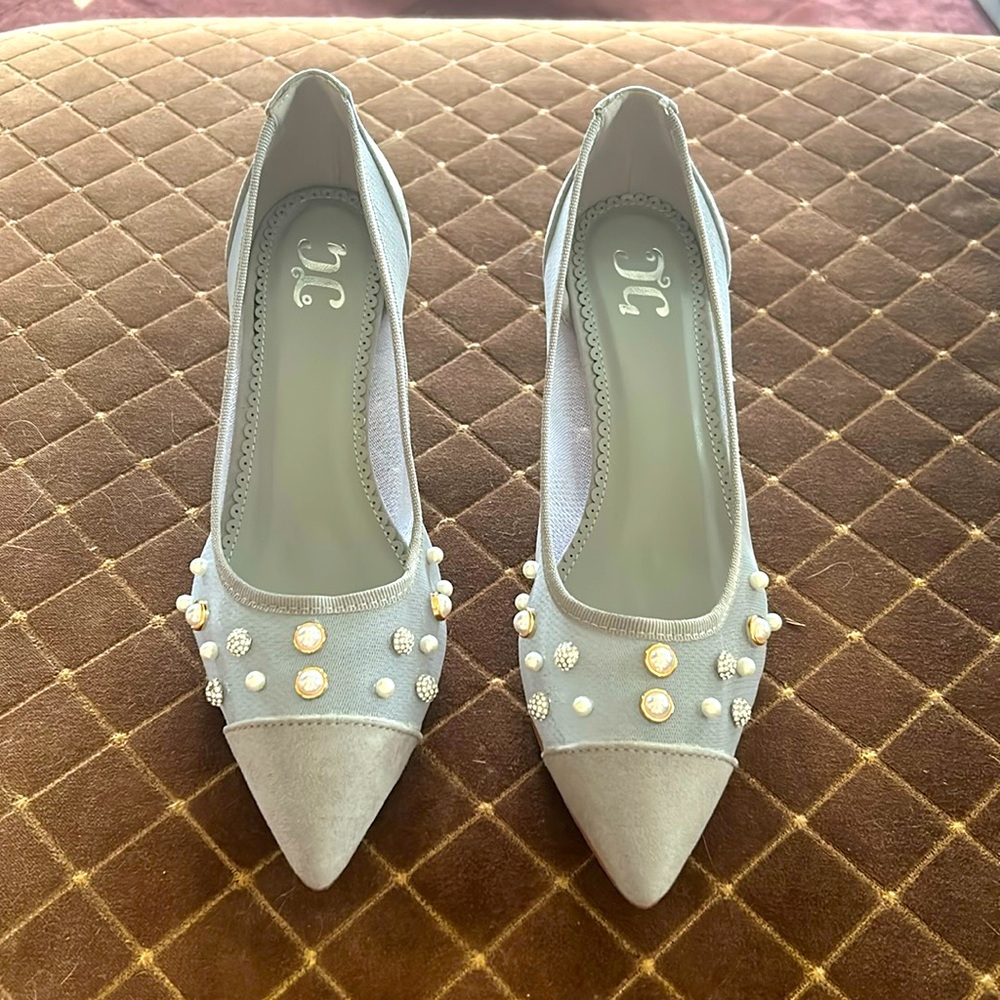 Gray heels with pearl and crystal details.